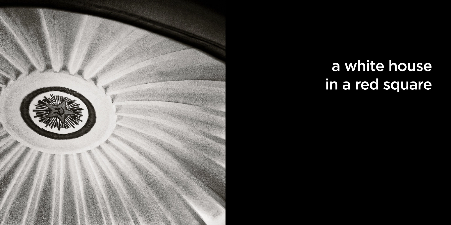 a white house in a red square