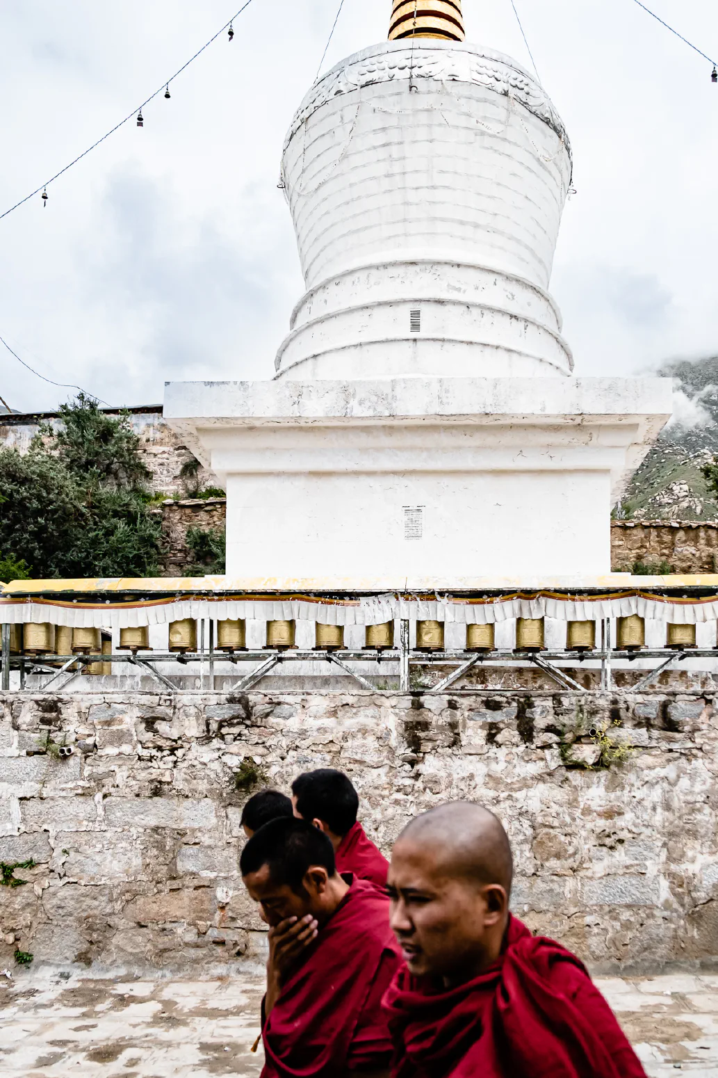 Monks on their way to a ceremony. Lhasa, Tibet. August 2013